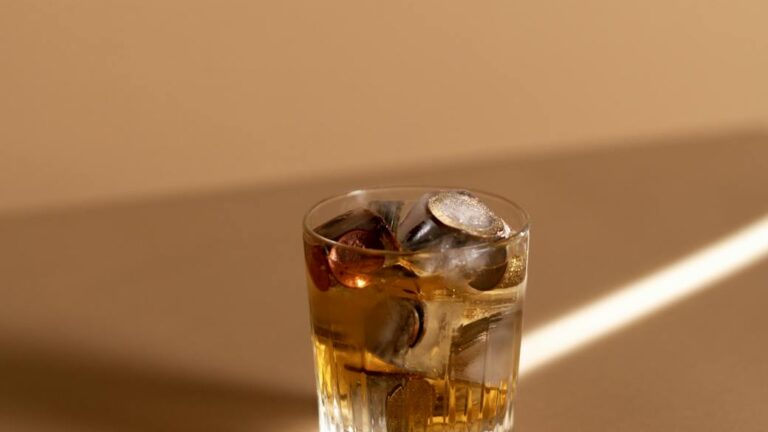 clear shot glass on white table