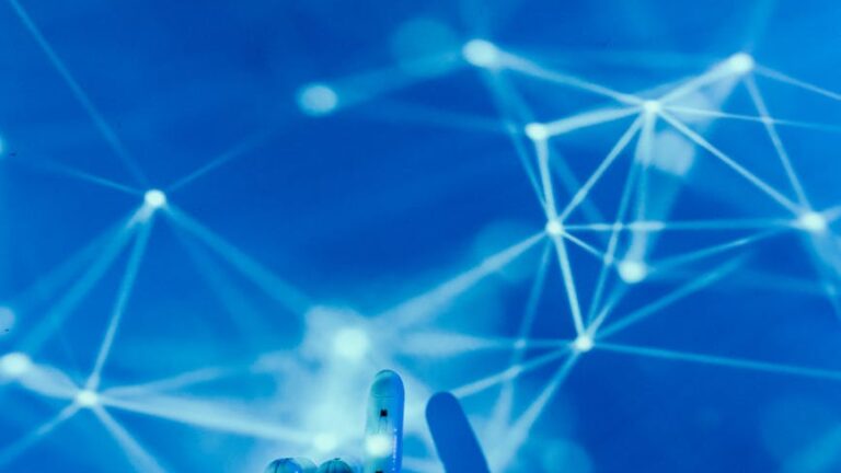 robot s hand on a blue background