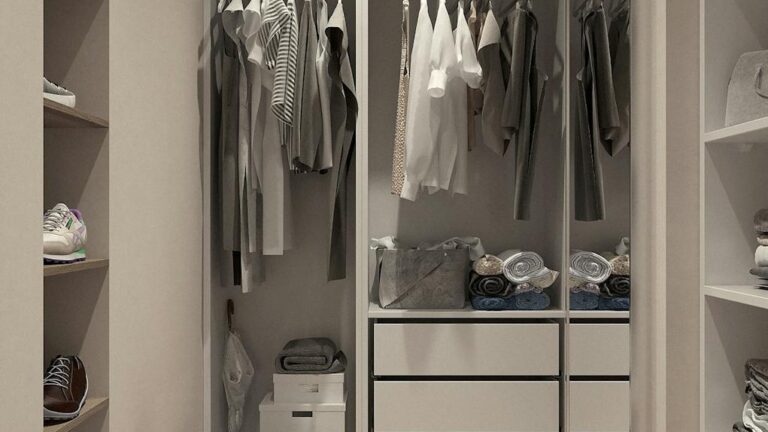 assorted clothes hanged inside cabinet